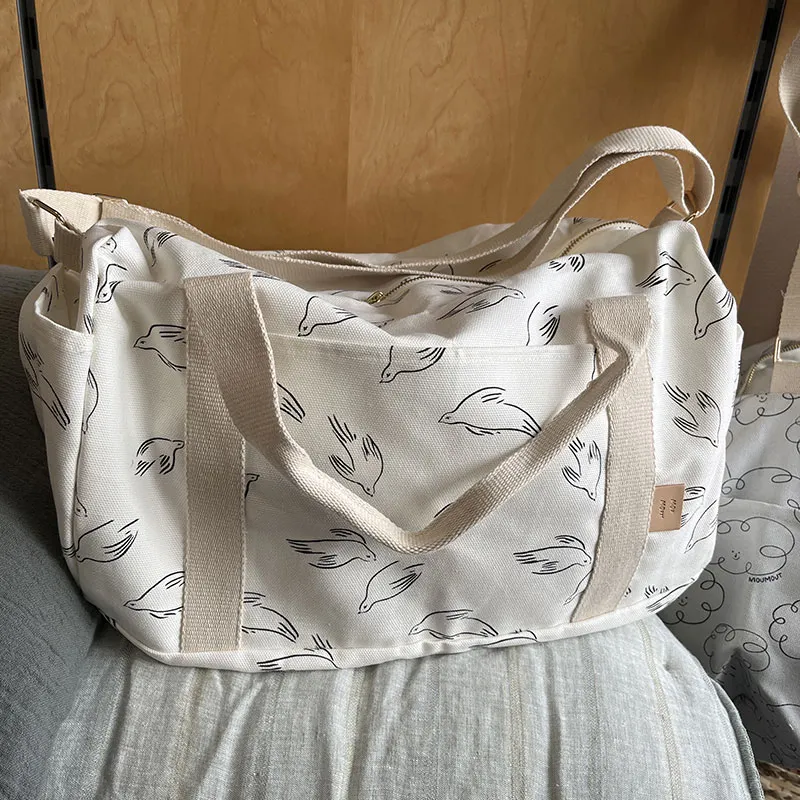 Bebeboutik Sac a langer Easy Bag Funny Rain